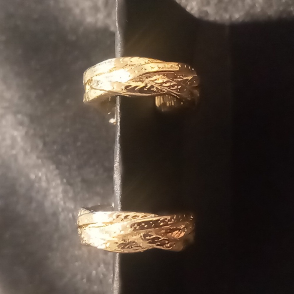Trifari gold tone clip on hoop earrings vintage .excellent condition.